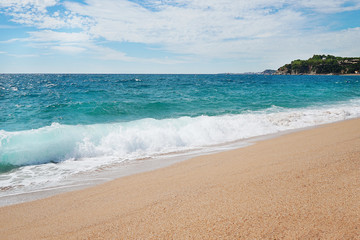 Beautiful beach, sea and footprints in sand