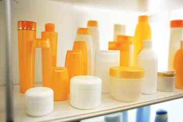 Stand with cosmetic products in retail shop