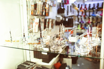 Professional barber scissors in cosmetic store