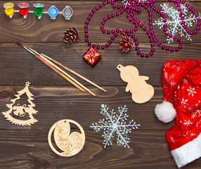 Christmas gifts and decorations on wooden table . Handmade.