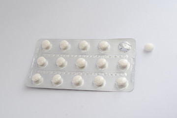 white pills in blister