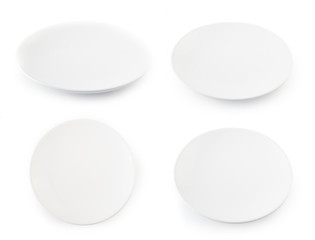 Set of white plates isolated on background