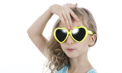 portrait of a little girl in yellow sunglasses
