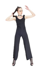 beautiful young fashion model with black dress in studio