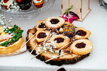 Dough lollipops on sticks.