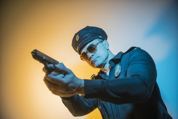 COP USA is holding a gun
