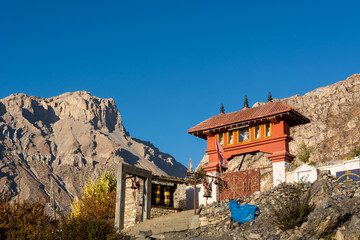 Buddhist temple on mountain slope.