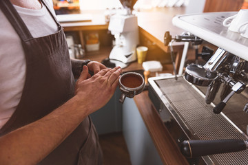 squeezed coffee beans in the portafilter