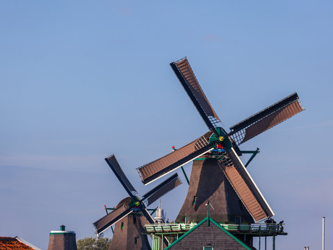 Traditional windmill on the shore of the lake, Holland