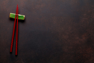 Sushi chopsticks on stone table