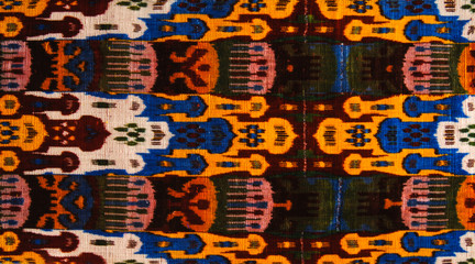 background from the tissue and textile with oriental ornaments and multi colored pattern