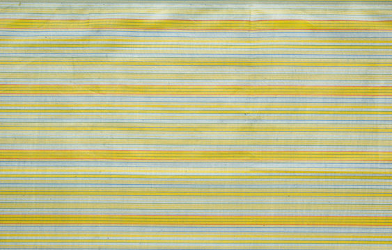 background of the fabric and textile drawings bands and lines yellow and green