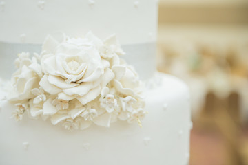 White wedding cake with flower