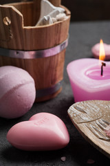 soap closeup with pink lit candle