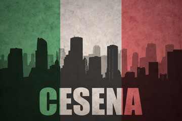 abstract silhouette of the city with text Cesena at the vintage italian flag