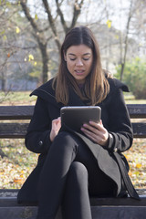 Fototapeta premium Young business woman with a tablet