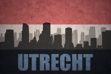 abstract silhouette of the city with text Utrecht at the vintage dutch flag