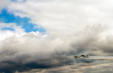 Fototapeta na wymiar Planes in the cloudy sky