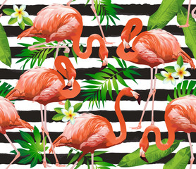 Naklejka premium Flamingo ptak i tropikalne kwiaty tło - wektor wzór