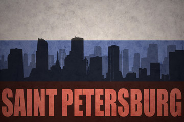 Naklejka premium abstract silhouette of the city with text Saint Petersburg at the vintage russian flag