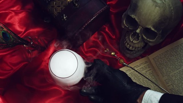 4k Abstract Halloween Background Composition with Skull, Glass with smoke