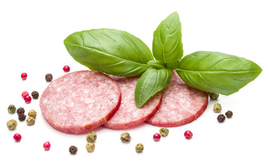 Salami smoked sausage three slices, basil leaves and peppercorns