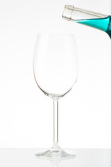 empty glass and blue wine