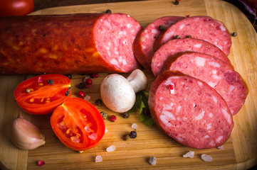 Sausage on a wooden background