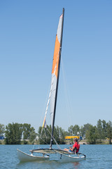 Fototapeta premium sailing on a lake - summer and sports theme