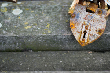 Heartshape padlock on a concrete background