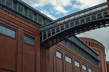 The metal structure  and brick wall in an old brewery in Poznan. © GKor