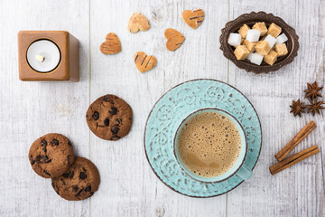 Fototapeta na wymiar Coffee with milk and cookies top view