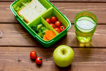 Healthy lunch box for student with juice