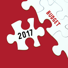 2017 budget word on jigsaw puzzle background