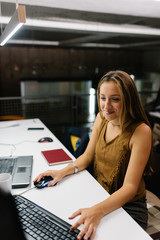 Girl at the office with a smile on her face