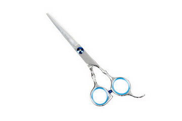 Professional haircutting scissors isolated on white background. Silver metal, stainless steel...