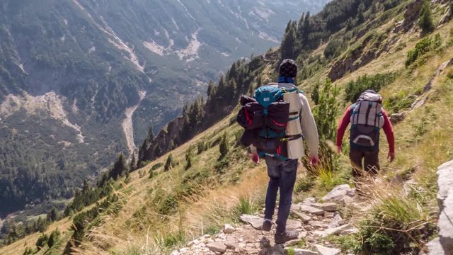 Men Carrying Backpacks While Trekking In Mountain Adventure Healthy Extreme Sport Lifestyle Vacation Nature Travel Landscape Valley Freedom Leisure Activity