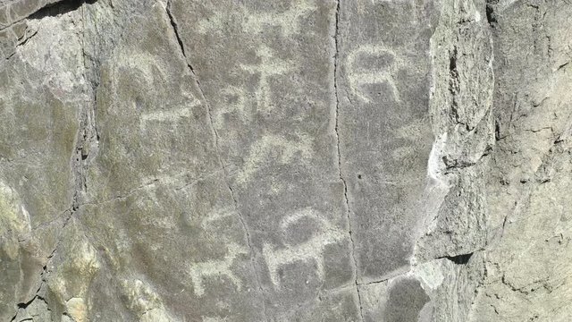 Ancient petroglyph on the rock. Altay, Russia.