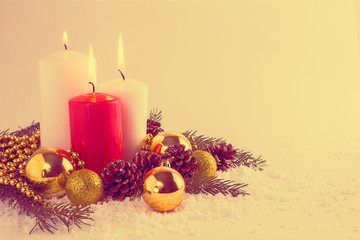 Christmas background with burning candles and golden beans, vint