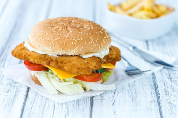 Fish Burger on wooden background