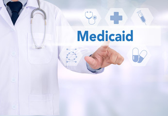 Medical insurance and Medicaid and stethoscope.