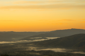 foggy sunrise landscape