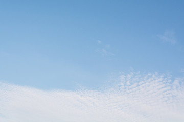 Blue sky with beautiful white clouds in sunny day.