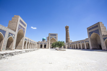 Fototapeta na wymiar Po-i-Kalyan complex, a medressa in the old town of Bukhara, Uzbekistan (Central Asia)