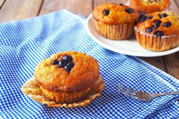 Close up of homemade banana muffins on a napkin.