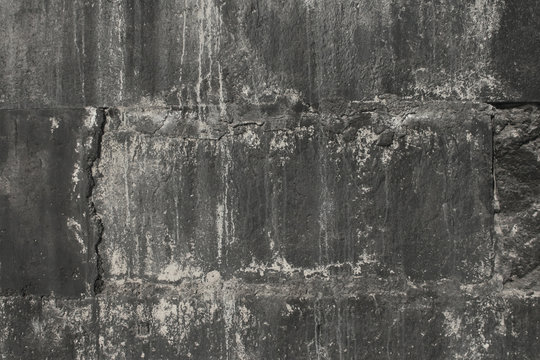 black wall of concrete blocks in a grunge style