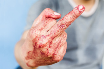 closeup of the scary hand Fuck you or fuck off  man giving the f