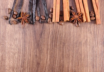 Spices and ingredients for cooking or baking on wooden surface, copy space for text
