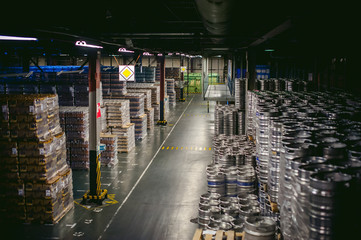Interior warehouse. pallets with bottles stand in rows stock