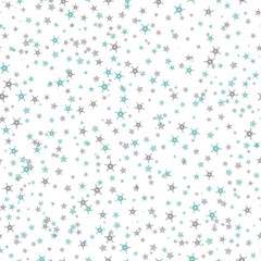 Seamless pattern of many blue and brown snowflakes on white back